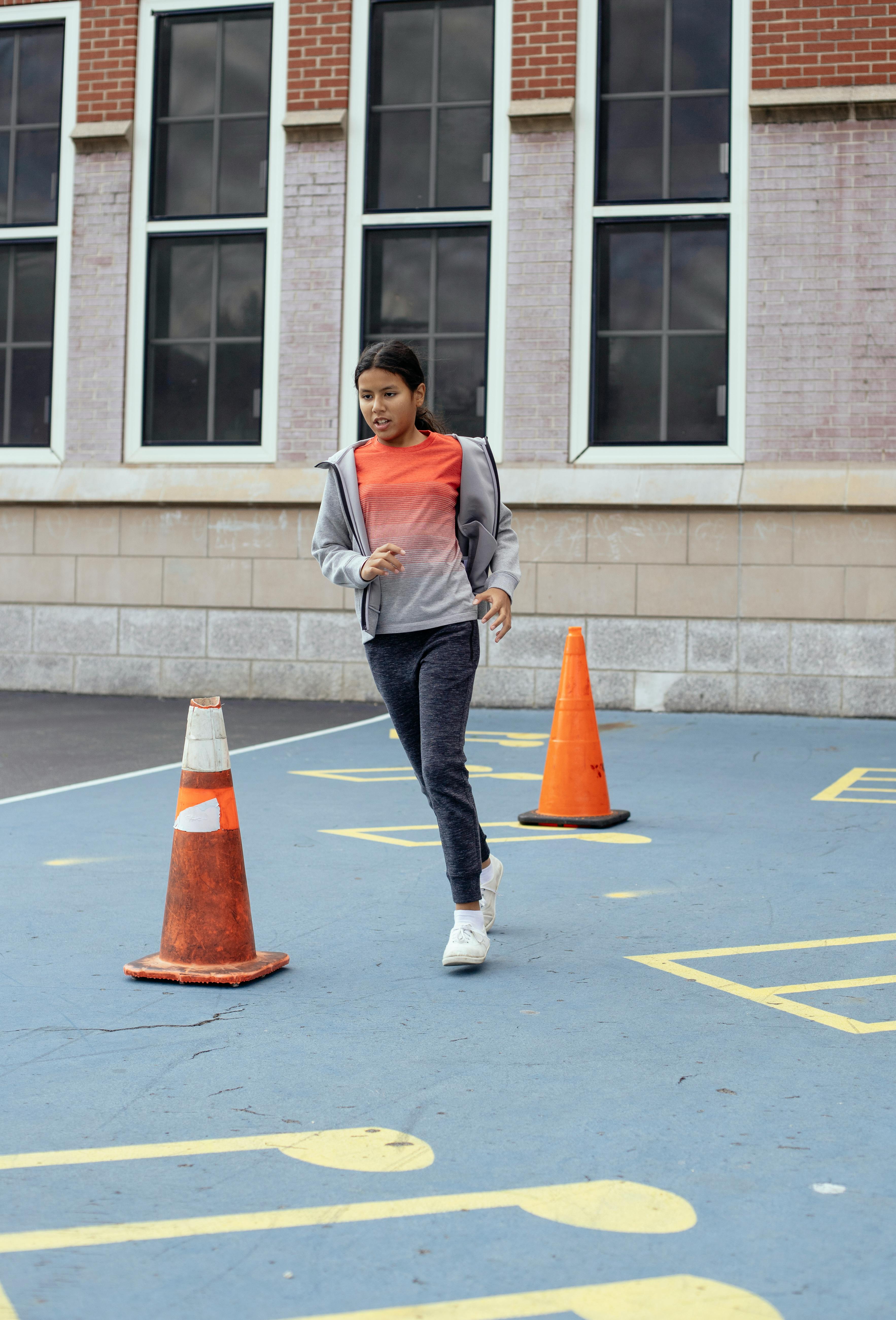 A young student playing sports, free from glasses.